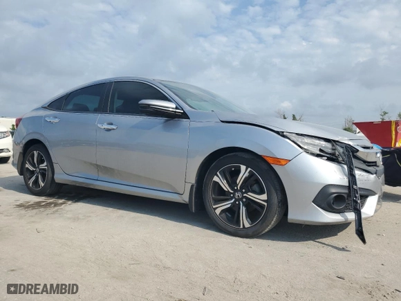 2017 Honda Civic Sedan Touring with VIN 19XFC1F98HE018889, listed as a Copart auction lot 66305154 with 58,571 mi miles and Salvage Title. Bid and sale history available at carsss.com. Image 4.