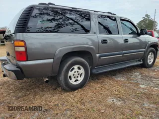 2001 Chevrolet Suburban LS z VIN 3GNEC16T51G199135, wystawiony jako IAAI lot #41748202 z przebiegiem 247 648 mil mil oraz . Historia ofert i sprzedaży dostępna na DreamBid. Obrazek 3.