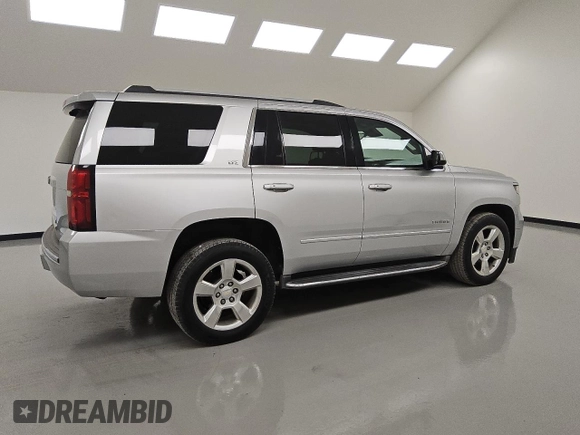 2016 Chevrolet Tahoe LTZ z VIN 1GNSCCKC4GR249391, wystawiony jako Copart lot #53579185 z przebiegiem 141 270 mil mil oraz Czysty tytuł • Clean title. Historia ofert i sprzedaży dostępna na DreamBid. Obrazek 3.