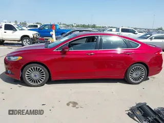 2014 Ford Fusion Titanium with VIN 3FA6P0K92ER293480, listed as a IAAI auction lot 41792642 with 156,828 mi miles. Bid and sale history available at carsss.com. Image 15.
