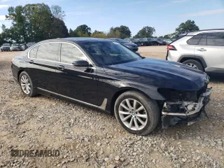 2018 BMW 7 Series 740i xDrive with VIN WBA7E4C5XJGV24003, listed as a Copart auction lot 71395443 with 63,558 mi miles. Bid and sale history available at carsss.com. Image 4.