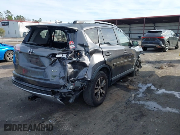 2018 Toyota RAV4 XLE with VIN JTMWFREV1JJ169926, listed as a IAAI auction lot 41464920 with 111,144 mi miles. Bid and sale history available at carsss.com. Image 4.