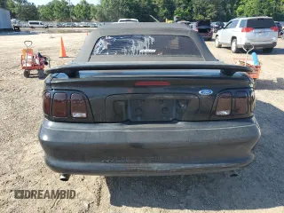 1994 Ford Mustang with VIN 1FALP45T2RF185428, listed as a Copart auction lot 55990495 with 111,353 mi miles and Salvage title. Bid and sale history available at DreamBid. Image 6.