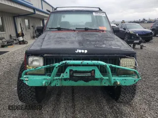 1993 Jeep Cherokee Sport with VIN 1J4FJ68S6PL506709, listed as a Copart auction lot 86638434 with 253,923 mi miles and Salvage Title. Bid and sale history available at carsss.com. Image 5.