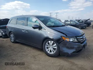 2014 Honda Odyssey EX-L with VIN 5FNRL5H64EB123541, listed as a Copart auction lot 52483705 with 77,996 mi miles and Salvage Title. Bid and sale history available at DreamBid. Image 4.