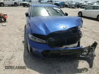 2023 BMW 3 Series 330i with VIN 3MW69FF00P8D04288, listed as a Copart auction lot 57181315 with 35,461 mi miles and Salvage title. Bid and sale history available at DreamBid. Image 13.