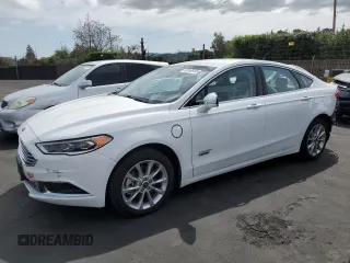 2018 Ford Fusion Energi SE with VIN 3FA6P0PU3JR233067, listed as a Copart auction lot 52165155 with 54,746 mi miles and Salvage Title. Bid and sale history available at carsss.com. Image 1.