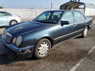 1997 Mercedes-Benz E 320 with VIN WDBJF55FXVA430115, listed as a Copart auction lot 43053715 with 158,057 mi miles and Clean Title. Bid and sale history available at DreamBid. Image 1.