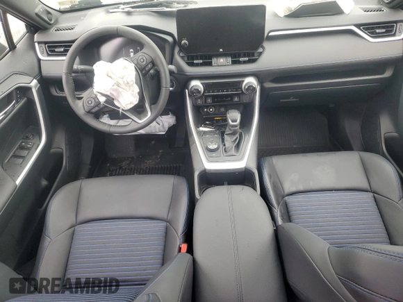 2024 Toyota RAV4 Hybrid XSE with VIN JTME6RFV0RD569013, listed as a Copart auction lot 57239165 with 5,187 mi miles and Salvage title. Bid and sale history available at DreamBid. Image 8.