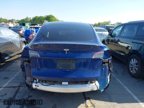 2023 Tesla Model Y Long Range with VIN 7SAYGDEE0PF762592, listed as a IAAI auction lot 41983933 with 28,510 mi miles and . Bid and sale history available at carsss.com. Image 16.