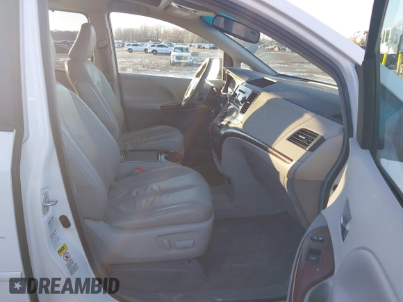 2012 Toyota Sienna XLE with VIN 5TDDK3DC4CS042464, listed as a IAAI auction lot 41199300 with 143,677 mi miles. Bid and sale history available at carsss.com. Image 5.