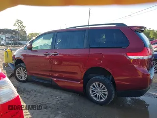2014 Toyota Sienna XLE with VIN 5TDYK3DCXES473671, listed as a IAAI auction lot 42243030 with 70,052 mi miles and . Bid and sale history available at DreamBid. Image 14.