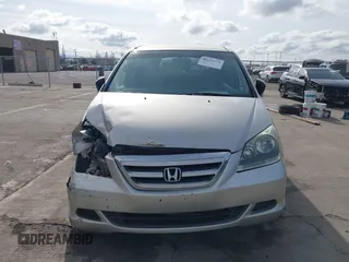 2005 Honda Odyssey LX with VIN 5FNRL38245B024753, listed as a IAAI auction lot 41839673 with 292,563 mi miles. Bid and sale history available at carsss.com. Image 12.