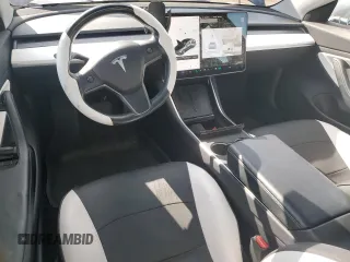 2019 Tesla Model 3 Mid Range with VIN 5YJ3E1EA6KF312754, listed as a Copart auction lot 50403855 with 148,217 mi miles and Salvage Title. Bid and sale history available at carsss.com. Image 8.