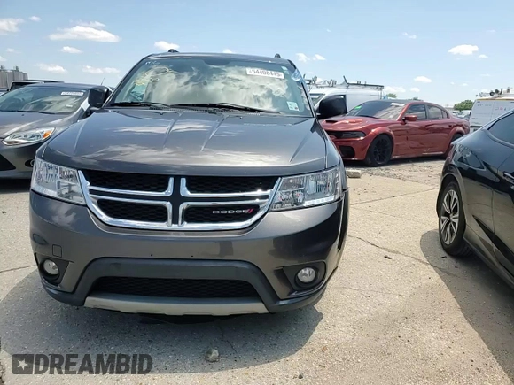 2014 Dodge Journey SXT with VIN 3C4PDCBG8ET140984, listed as a Copart auction lot 54408445 with 135,290 mi miles and Salvage Title. Bid and sale history available at DreamBid. Image 15.