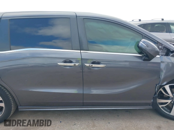 2022 Honda Odyssey Touring with VIN 5FNRL6H80NB023623, listed as a IAAI auction lot 41512586 with 63,329 mi miles and . Bid and sale history available at DreamBid. Image 14.