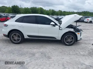 2021 Porsche Macan with VIN WP1AA2A52MLB06086, listed as a IAAI auction lot 39423611 with 56,559 mi miles and . Bid and sale history available at DreamBid. Image 13.