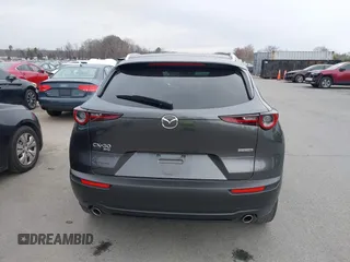 2022 Mazda CX-30 S Premium with VIN 3MVDMBDL9NM434619, listed as a IAAI auction lot 41620655 with 46,557 mi miles and . Bid and sale history available at carsss.com. Image 16.