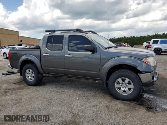 2008 Nissan Frontier SE with VIN 1N6AD07UX8C406795, listed as a Copart auction lot 61303185 with 145,742 mi miles and Salvage title. Bid and sale history available at DreamBid. Image 4.
