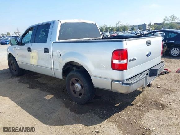 2005 Ford F-150 XLT with VIN 1FTPW12595FB54061, listed as a IAAI auction lot 41872078 with 174,399 mi miles. Bid and sale history available at carsss.com. Image 3.