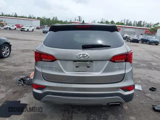 2017 Hyundai Santa Fe 2.4L with VIN 5NMZU3LB2HH014844, listed as a IAAI auction lot 42657624 with 93,533 mi miles and . Bid and sale history available at DreamBid. Image 17.