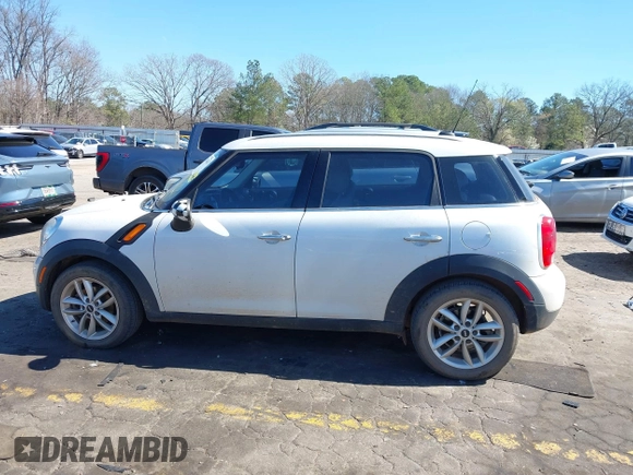 2014 MINI Countryman with VIN WMWZB3C52EWR42241, listed as a IAAI auction lot 41734963 with 121,325 mi miles and . Bid and sale history available at DreamBid. Image 14.