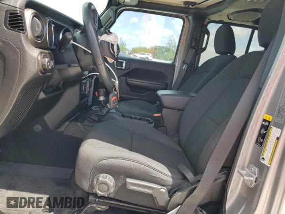 2020 Jeep Wrangler Unlimited Willys with VIN 1C4HJXDG7LW186671, listed as a Copart auction lot 54090865 with 67,882 mi miles and Salvage title. Bid and sale history available at DreamBid. Image 7.