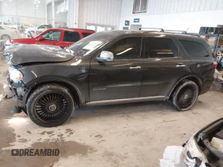 2011 Dodge Durango Citadel with VIN 1D4SE5GT6BC632724, listed as a IAAI auction lot 41590123 with 118,509 mi miles and . Bid and sale history available at DreamBid. Image 14.