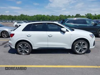 2021 Audi Q3 S line Premium Plus z VIN WA1EECF33M1024605, wystawiony jako IAAI lot #42062366 z przebiegiem 94 641 mil mil oraz . Historia ofert i sprzedaży dostępna na DreamBid. Obrazek 13.