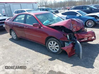 2003 Toyota Camry LE z VIN 4T1BF30K83U049174, wystawiony jako IAAI lot #42088529 z przebiegiem 3 873 mil mil oraz . Historia ofert i sprzedaży dostępna na DreamBid. Obrazek 1.