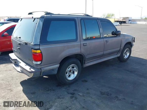 1996 Ford Explorer XL with VIN 1FMDU34X5TZB86872, listed as a IAAI auction lot 42573906 with 118,304 mi miles and . Bid and sale history available at DreamBid. Image 4.