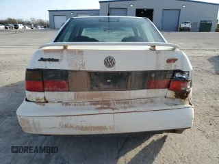 1998 Volkswagen Jetta z VIN 3VWVA81H4WM127083, wystawiony jako Copart lot #88396925 z przebiegiem 192 757 mil mil oraz Szkoda całkowita • Salvage title. Historia ofert i sprzedaży dostępna na DreamBid. Obrazek 6.