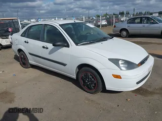 2004 Ford Focus z VIN 1FAFP33Z24W176963, wystawiony jako IAAI lot #42127710 z przebiegiem 389 589 mil mil oraz . Historia ofert i sprzedaży dostępna na DreamBid. Obrazek 1.