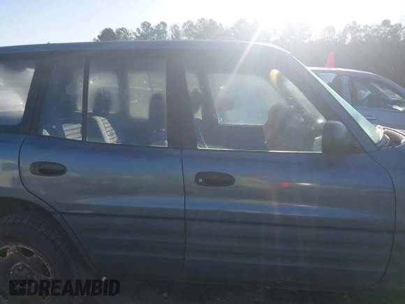 1997 Toyota RAV4 with VIN JT3GP10VXV0015872, listed as a IAAI auction lot 41827830 with 314,640 mi miles and . Bid and sale history available at DreamBid. Image 13.