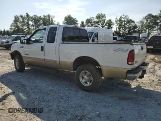 2000 Ford F-250 XL with VIN 1FTNX21F3YEB32295, listed as a Copart auction lot 60867745 with 329,194 mi miles and Salvage title. Bid and sale history available at DreamBid. Image 2.