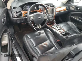 2007 Jaguar XK XKR with VIN SAJWA44C879B19251, listed as a Copart auction lot 50807595 with 100,715 mi miles and Salvage Title. Bid and sale history available at DreamBid. Image 8.