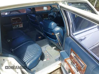 1991 Cadillac Brougham z VIN 1G6DW54E5MR723477, wystawiony jako IAAI lot #42535123 z przebiegiem 300 768 mil mil oraz . Historia ofert i sprzedaży dostępna na DreamBid. Obrazek 8.