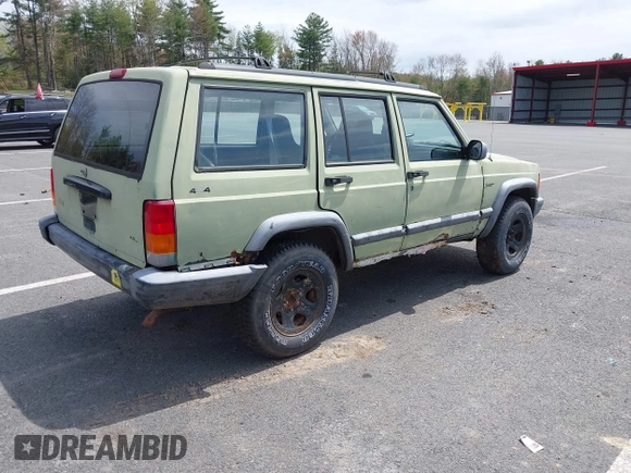 1998 Jeep Cherokee Sport with VIN 1J4FJ68SXWL264165, listed as a IAAI auction lot 42168443 with 244,828 mi miles and . Bid and sale history available at DreamBid. Image 4.