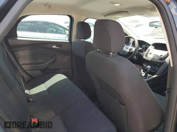 2018 Ford Focus SE z VIN 1FADP3F22JL265175, wystawiony jako Copart lot #62916255 z przebiegiem 90 348 mil mil oraz Szkoda całkowita • Salvage title. Historia ofert i sprzedaży dostępna na DreamBid. Obrazek 10.