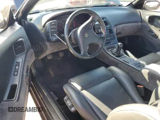 1990 Nissan 300ZX z VIN JN1CZ24A8LX006855, wystawiony jako Copart lot #73952854 z przebiegiem 74 547 mil mil oraz Szkody całkowita. Historia ofert i sprzedaży dostępna na DreamBid. Obrazek 8.
