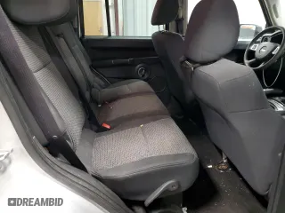 2010 Jeep Commander Sport with VIN 1J4RG4GK2AC127697, listed as a Copart auction lot 87582415 with 204,676 mi miles and Salvage Title. Bid and sale history available at carsss.com. Image 11.