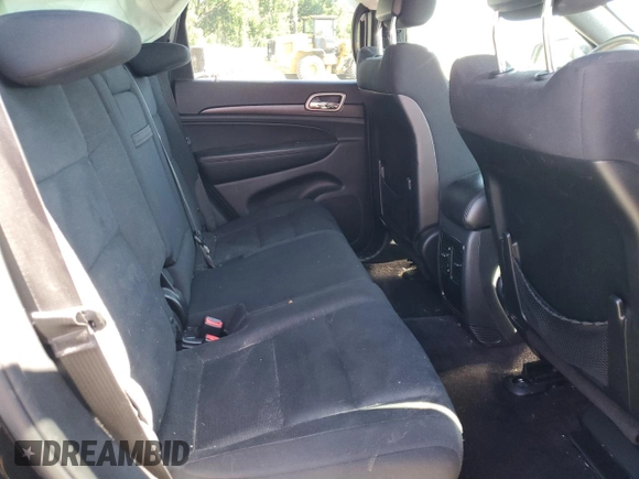 2017 Jeep Grand Cherokee Laredo with VIN 1C4RJEAG9HC780281, listed as a Copart auction lot 50747024 with 100,446 mi miles and Salvage title. Bid and sale history available at DreamBid. Image 11.