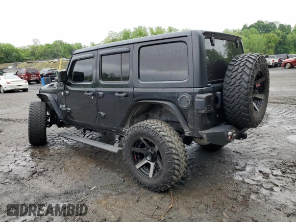 2018 Jeep Wrangler Unlimited Sport S z VIN 1C4HJXDG4JW137697, wystawiony jako Copart lot #56577525 z przebiegiem 42 297 mil mil oraz Szkoda całkowita • Salvage title. Historia ofert i sprzedaży dostępna na DreamBid. Obrazek 2.