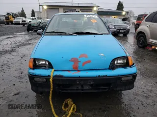 1992 Geo Metro z VIN 2C1MR2467N6724779, wystawiony jako Copart lot #81355814 z przebiegiem 85 587 mil mil oraz Szkody całkowita. Historia ofert i sprzedaży dostępna na DreamBid. Obrazek 5.
