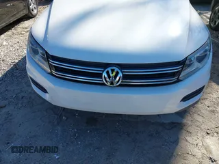 2012 Volkswagen Tiguan SE with VIN WVGAV7AX9CW590965, listed as a IAAI auction lot 41852407 with 153,953 mi miles and . Bid and sale history available at DreamBid. Image 6.