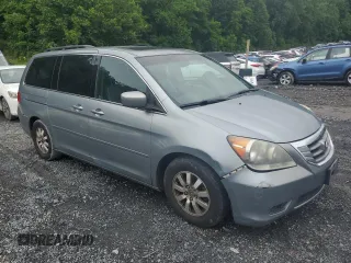2008 Honda Odyssey EX-L с VIN 5FNRL38728B026100, выставлен на аукционе Copart как лот 61430225 с пробегом 168 037 миль миль и Чистый • Clean title. История ставок и продаж доступна на DreamBid. Изображение 4.