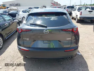 2024 Mazda CX-30 S Select Sport z VIN 3MVDMBBM5RM626265, wystawiony jako IAAI lot #42220770 z przebiegiem 17 895 mil mil oraz . Historia ofert i sprzedaży dostępna na DreamBid. Obrazek 17.