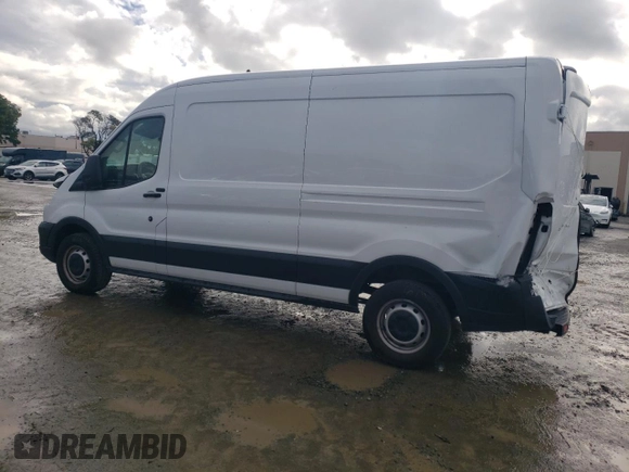 2021 Ford Transit Cargo with VIN 1FTBR1CG7MKA88875, listed as a Copart auction lot 84705324 with 23,654 mi miles and Salvage Title. Bid and sale history available at DreamBid. Image 2.