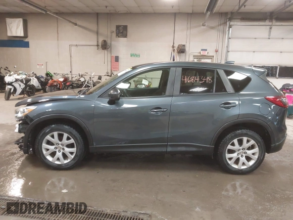 2013 Mazda CX-5 Touring with VIN JM3KE4CE4D0157892, listed as a IAAI auction lot 41684348 with 146,496 mi miles and . Bid and sale history available at DreamBid. Image 15.