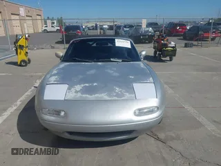 1991 Mazda MX-5 Miata Special Edition z VIN JM1NA3511M1235948, wystawiony jako IAAI lot #42322754 z przebiegiem 151 065 mil mil oraz . Historia ofert i sprzedaży dostępna na DreamBid. Obrazek 12.